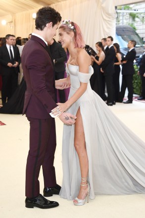 Shawn Mendes, Hailey Rhode Baldwin. Shawn Mendes, left, and Hailey Baldwin attend The Metropolitan Museum of Art's Costume Institute benefit gala celebrating the opening of the Heavenly Bodies: Fashion and the Catholic Imagination exhibition, in New York2018 MET Museum Costume Institute Benefit Gala, New York, USA - 07 May 2018