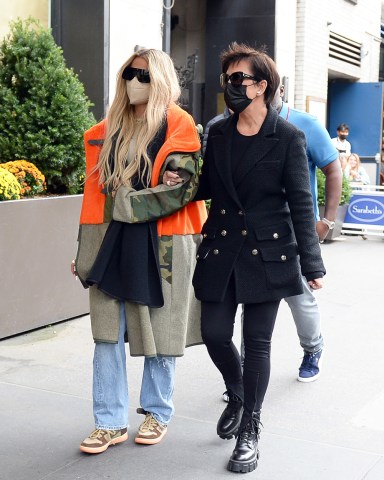 Khloe Kardashian and her mom  Kris Jenner are seen holding hands together while filming the TV Show in Central Park New York City  Pictured: Khloe Kardashian,Kris Jenner Ref: SPL5264724 091021 NON-EXCLUSIVE Picture by: Elder Ordonez / SplashNews.com  Splash News and Pictures USA: +1 310-525-5808 London: +44 (0)20 8126 1009 Berlin: +49 175 3764 166 photodesk@splashnews.com  World Rights, No Poland Rights, No Portugal Rights, No Russia Rights