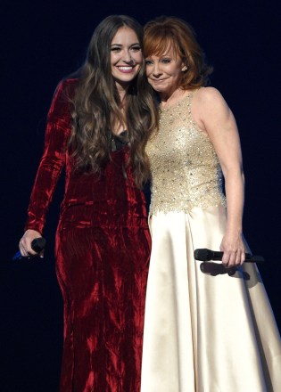 Lauren Daigle, left, and Reba McEntire perform "Back to God" at the 52nd annual Academy of Country Music Awards at the T-Mobile Arena, in Las Vegas
52nd Annual Academy Of Country Music Awards - Show, Las Vegas, USA - 2 Apr 2017