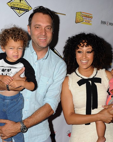 Adam Housley and Tamera Mowry-Housley with son Aden Housley and daughter Ariah Talea Housley
Milk and Bookies Story Time Celebration, Los Angeles, America - 17 Apr 2016
Milk and Bookies - 7th Annual Story Time Celebration