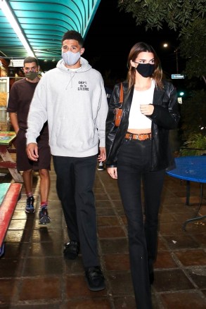 West Hollywood, CA  - *EXCLUSIVE*  - Kendall Jenner and boyfriend Devin Booker appear to still going strong as they are spotted enjoying a romantic date night out in West Hollywood.  *SHOT 10/03/20*Pictured: Kendall Jenner, Devin BookerBACKGRID USA 4 OCTOBER 2020 BYLINE MUST READ: BACKGRIDUSA: +1 310 798 9111 / usasales@backgrid.comUK: +44 208 344 2007 / uksales@backgrid.com*UK Clients - Pictures Containing ChildrenPlease Pixelate Face Prior To Publication*