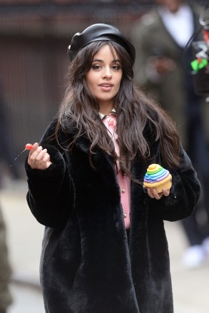 Camila Cabello holds a cupcake while filming a Mastercard commercial in New York CityPictured: Camila CabelloRef: SPL5047665 061218 NON-EXCLUSIVEPicture by: Elder Ordonez / SplashNews.comSplash News and PicturesLos Angeles: 310-821-2666New York: 212-619-2666London: 0207 644 7656Milan: 02 4399 8577photodesk@splashnews.comWorld Rights, No Portugal Rights