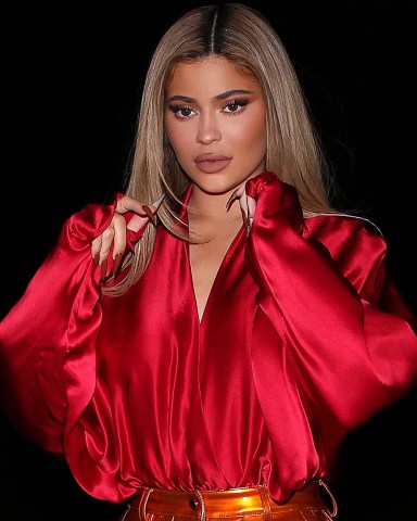 EXCLUSIVE: Billionaire Cosmetics mogul, Kylie Jenner steps out for dinner wearing bright orange pants and a red shirt in Beverly Hills, CA. 14 Nov 2020 Pictured: Kylie Jenner. Photo credit: TheRealSPW / MEGA TheMegaAgency.com +1 888 505 6342 (Mega Agency TagID: MEGA715340_004.jpg) [Photo via Mega Agency]