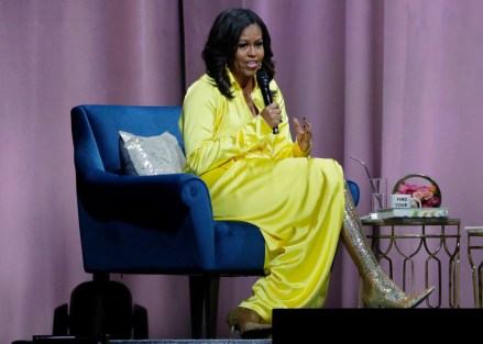 Former first lady Michelle Obama speaks as she is interviewed by Sarah Jessica Parker during an appearance for her book, "Becoming: An Intimate Conversation with Michelle Obama" at Barclays Center, in New York
Michelle Obama Book Tour, New York, USA - 19 Dec 2018