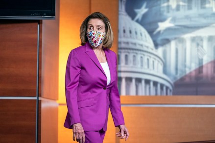 Speaker of the House Nancy Pelosi, D-Calif., holds a news conference on the day after violent protesters loyal to President Donald Trump stormed the U.S. Congress, at the Capitol in Washington, Thursday, Jan. 7, 2021. (AP Photo/J. Scott Applewhite)