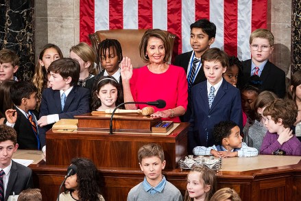Democratic Speaker of the House Nancy Pelosi, surrounded by her grandchildren and the children of other lawmakers, is sworn-in to reclaim the speakership in the US Capitol in Washington, DC, USA, 03 January 2019. Pelosi and the House of Representatives are expected to vote later today on a bill to re-open the government, which is in its 11th day of a partial shutdown.
Nancy Pelosi becomes the next Speaker of the House, Washington, USA - 03 Jan 2019
