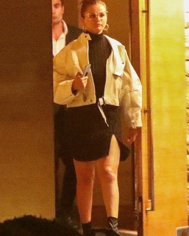 *EXCLUSIVE* Malibu, CA - A fashionable Selena Gomez steps out in a little black dress and booties while exiting a pre-birthday celebration dinner with a friend at Nobu in Malibu. While leaving Selena makes time to take pictures with a fan. The actress/singer turns 30 on July 22nd.Pictured: Selena GomezBACKGRID USA 21 JULY 2022 USA: +1 310 798 9111 / usasales@backgrid.comUK: +44 208 344 2007 / uksales@backgrid.com*UK Clients - Pictures Containing ChildrenPlease Pixelate Face Prior To Publication*