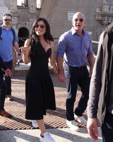 Rome, ITALY  - Billionaire Jeff Bezos and Lauren Sanchez walk hand in hand while visiting the Colosseum in Rome. Later the happy couple lunched at The Court restaurant terrace in front of the Colosseum.

Pictured: Jeff Bezos, Lauren Sanchez

BACKGRID USA 15 OCTOBER 2022 

BYLINE MUST READ: Cobra Team / BACKGRID

USA: +1 310 798 9111 / usasales@backgrid.com

UK: +44 208 344 2007 / uksales@backgrid.com

*UK Clients - Pictures Containing Children
Please Pixelate Face Prior To Publication*