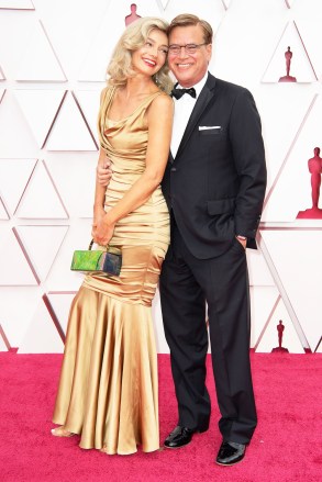 FOR EDITORIAL USE ONLY. No marketing or advertising is permitted without the prior consent of A.M.P.A.S.Mandatory Credit: Photo by Matt Petit/A.M.P.A.S./Shutterstock (11875500tj)Aaron Sorkin (L) and Paulina Porizkova arrive on the red carpet of The 93rd Oscars® at Union Station in Los Angeles, CA on Sunday, April 25, 2021.93rd Annual Academy Awards, Arrivals, Los Angeles, USA - 25 Apr 2021