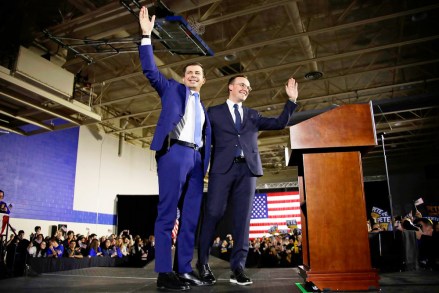 Pete Buttigieg, Chasten Glezman. Democratic presidential candidate former South Bend, Ind., Mayor Pete Buttigieg, left, is joined by his husband Chasten Glezman after speaking to supporters at a caucus night rally in Des Moines, IowaElection 2020 Pete Buttigieg, Des Moines, USA - 03 Feb 2020