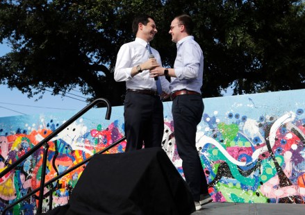 Democratic presidential candidate Pete Buttigieg, the mayor of South Bend, Ind., left, is introduced by his husband Chasten Glezman, right, during a fundraiser at the Wynwood Walls, in Miami
Election 2020 Pete Buttigieg, Miami, USA - 20 May 2019
