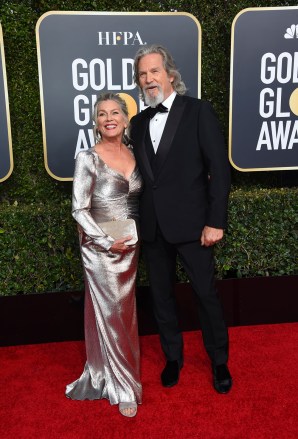 Jeff Bridges, right, and Susan Geston arrive at the 76th annual Golden Globe Awards at the Beverly Hilton Hotel on Sunday, Jan. 6, 2019, in Beverly Hills, Calif. (Photo by Jordan Strauss/Invision/AP)