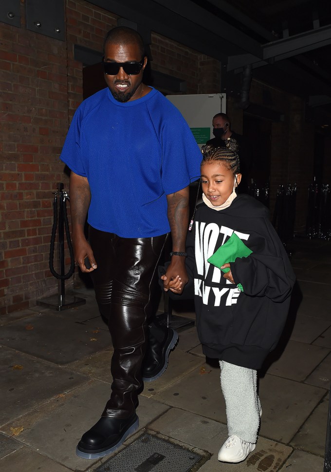 North West With Green Clutch