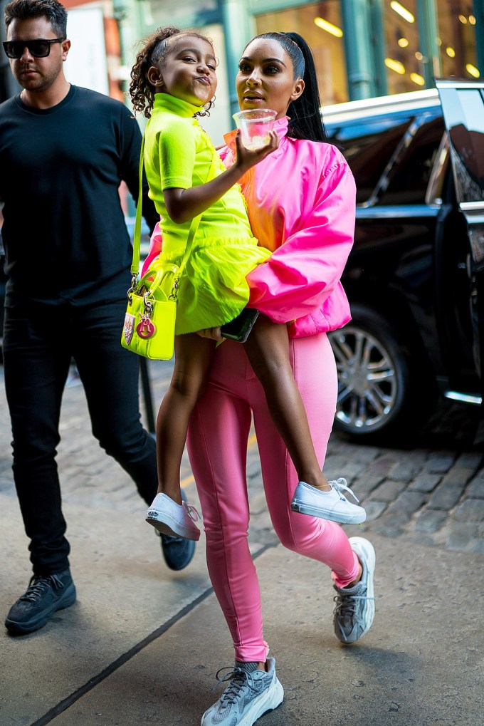 North West With Lime Green Bag
