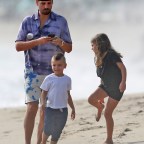 *EXCLUSIVE* Scott Disick goes for a walk on the beach with kids in Malibu