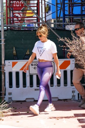 Jennifer Lopez sneaks out of Anatomy gym in Miami Beach via a side exit wearing a white Guess top and purple leggings. It seems she did not want to be spotted with her new beau Ben Affleck, who left through the main entrance.Pictured: Jennifer LopezRef: SPL5228728 240521 NON-EXCLUSIVEPicture by: Pichichipixx.com / SplashNews.comSplash News and PicturesUSA: +1 310-525-5808London: +44 (0)20 8126 1009Berlin: +49 175 3764 166photodesk@splashnews.comWorld Rights