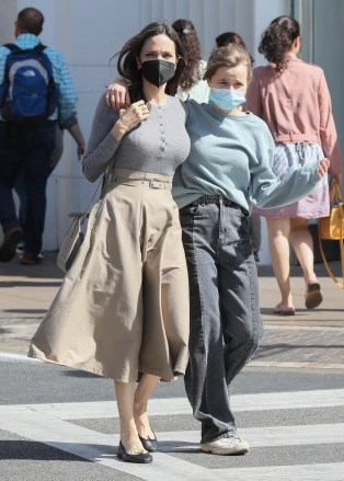 Los Angeles, CA - *EXCLUSIVE* - Angelina Jolie walks arm in arm with her daughter Shiloh while shopping at The Grove in Los Angeles.Pictured: Angelina Jolie, Shiloh Jolie-PittBACKGRID USA 21 MARCH 2022 BYLINE MUST READ: BACKGRIDUSA: +1 310 798 9111 / usasales@backgrid.comUK: +44 208 344 2007 / uksales@backgrid.com*UK Clients - Pictures Containing ChildrenPlease Pixelate Face Prior To Publication*