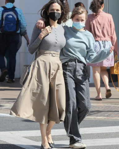 Los Angeles, CA - *EXCLUSIVE* - Angelina Jolie walks arm in arm with her daughter Shiloh while shopping at The Grove in Los Angeles.Pictured: Angelina Jolie, Shiloh Jolie-PittBACKGRID USA 21 MARCH 2022 BYLINE MUST READ: BACKGRIDUSA: +1 310 798 9111 / usasales@backgrid.comUK: +44 208 344 2007 / uksales@backgrid.com*UK Clients - Pictures Containing ChildrenPlease Pixelate Face Prior To Publication*