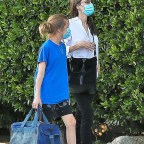 *EXCLUSIVE* A masked Angelina Jolie drops off her daughter Vivienne at a residence in LA