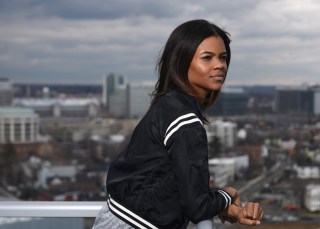 ADVANCE FOR WEEKEND EDITIONS MARCH 12-13 - In this Feb. 29, 2016 photo, Degree180 CEO Candace Owens poses overlooking the city from her home office in Stamford, Conn. Owens was bullied with racist threats as a student in high school and is now launching an anti-bullying website, Social Autopsy, which launches its beta version on Friday, March 4. (Tyler Sizemore/Hearst Connecticut Media) MANDATORY CREDIT Sizemore/Hearst Connecticut Media)