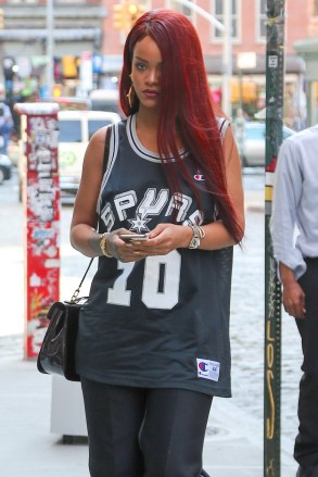 ** RESTRICTIONS: ONLY UNITED STATES ** New York, NY - **USA ONLY** New York, NY - Part 2 - Songstress Rihanna is spotted shopping in Soho with a friend. The bombshell brunette showed off a bit of side boob as she donned a Spurs jersey without a bra underneath. Rihanna rocked long red extensions and accessorized with a patent leather Louis Vuitton handbag.  AKM-GSI        May  8, 2015**USA ONLY**To License These Photos, Please Contact :  Steve Ginsburg (310) 505-8447 (323) 423-9397 steve@akmgsi.com sales@akmgsi.com  or  Maria Buda (917) 242-1505 mbuda@akmgsi.com ginsburgspalyinc@gmail.com 05/08/2015 Copyright © 2014 AKM-GSI, Inc. Steve Ginsburg310.798.9111 x227310.505.8447steve@akmgsi.comsales@akmgsi.com