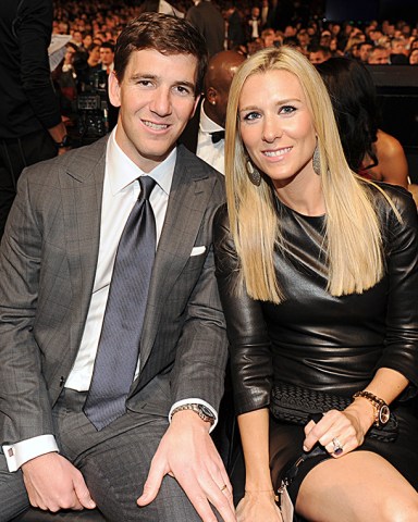 Eli Manning, left, and Abby McGrew attend the 3rd annual NFL Honors at Radio City Music Hall, in New York 3rd Annual NFL Honors - Inside, New York, USA