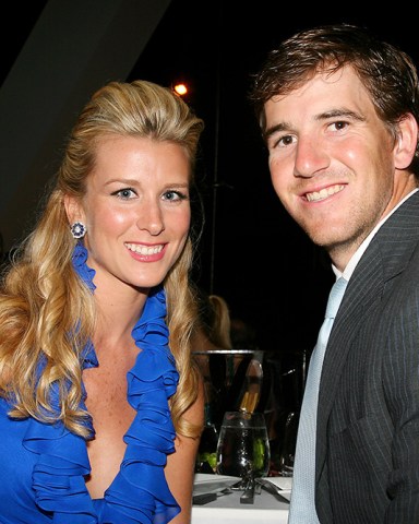 Eli Manning and Abby McGrew
The 36th Film Society Of Lincoln Center's Gala Tribute Honoring Tom Hanks at Alice Tully Hall, New York, America - 27 Apr 2009
Oscar winner Tom Hanks has been honoured at the Film Society's 36th Annual Gala in New York. The star, who is known as being Hollywood's "Mr Nice Guy", was awarded with the society's Chaplin Prize. This award is named after its first recipient, silent-film legend Charlie Chaplin, who, in 1972, returned to the US from exile to accept the commendation. Previous winners have also included Alfred Hitchcock, Billy Wilder, Laurence Olivier, Federico Fellini, Elizabeth Taylor and Meryl Streep. A host of Hollywood stars were on hand to see Hanks collect his award today, including his wife Rita Wilson, Julia Roberts, Charlize Theron, Steven Spielberg and Bruce Springsteen. The evening also featured tributes by writer/director Nora Ephron, actress Sally Field, director Ron Howard and writer/director Mike Nichols.