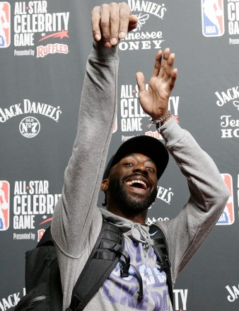 Famous Los arrives on the red carpet prior to an NBA Celebrity All-Star basketball game in Charlotte, N.C., Friday, Feb. 15, 2019. (AP Photo/Gerry Broome)