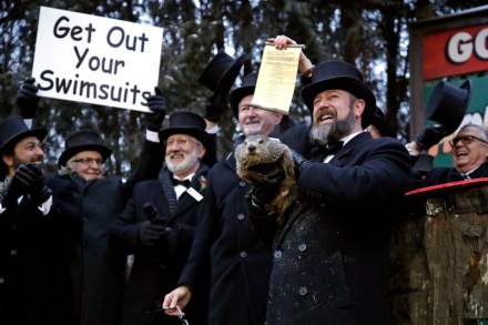 John Griffiths Al Dereume. Groundhog Club co-handler Al Dereume, second from right, holds Punxsutawney Phil, the weather prognosticating groundhog, during the 133rd celebration of Groundhog Day on Gobbler's Knob in Punxsutawney, Pa. . Phil's handlers said that the groundhog has forecast an early spring
Groundhog Day, Punxsutawney, USA - 02 Feb 2019