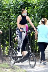Miami, FL  - *EXCLUSIVE*  - Jennifer Lopez seen going for a non traditional bike ride today with a trainer and some friends.  Looking fantastic in a sports bra and printed leggings, Jennifer worked up a sweat with a ElliptiGo Bike and also stayed safe with a tie dye protective mask. *Shot on July 11, 2020*

Pictured: Jennifer Lopez

BACKGRID USA 12 JULY 2020 

USA: +1 310 798 9111 / usasales@backgrid.com

UK: +44 208 344 2007 / uksales@backgrid.com

*UK Clients - Pictures Containing Children
Please Pixelate Face Prior To Publication*
