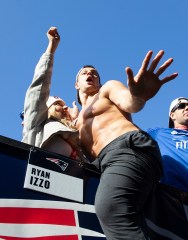 Super Bowl LIII Champions New England Patriots tight end Rob Gronkowski (R) gyrates as he dances with his girlfriend Camille Kostek (L) on the side of a flat bed truck during a celebration parade on the streets of Boston, Massachusetts, USA 05 February 2019. The New England Patriots defeated the Los Angeles Rams to win Super Bowl LIII, their sixth championship in seventeen years.
New England Patriots Super Bowl Championship Parade, Boston, USA - 05 Feb 2019