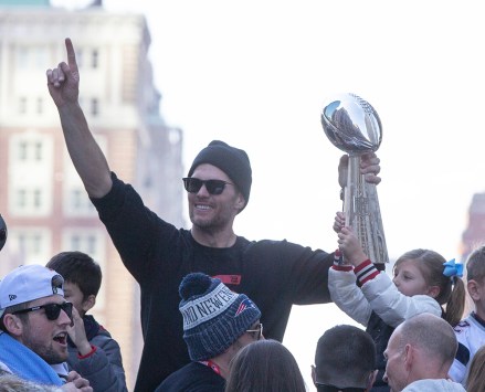 Super Bowl LIII Champions New England Patriots quarterback Tom Brady (L) gestures to the crowd as he and his daughter Vivian Lake Brady (R) hold the Vince Lombardi Trophy while they ride a duck boat during a celebration parade on the streets of Boston, Massachusetts, USA 05 February 2019. The New England Patriots defeated the Los Angeles Rams to win Super Bowl LIII, their sixth championship in seventeen years.
New England Patriots Super Bowl Championship Parade, Boston, USA - 05 Feb 2019