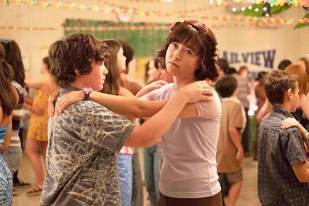 PEN15 -- "Dance" - Episode 110 - It’s the night of their first school dance but Anna and Maya are on bad terms. They’ll have to navigate this unfamiliar terrain set to billboard hits, by themselves. Sam (Taj Cross) and Maya (Maya Erskine), shown. (Photo by: Alex Lombardi/Hulu)