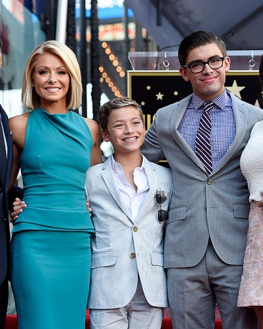 Television personality Kelly Ripa, second from left, poses with, left to right, her husband Mark Consuelos and their children Joaquin, Michael and Lola during a ceremony awarding Ripa with a star on the Hollywood Walk of Fame, in Los Angeles
APTOPIX Kelly Ripa Honored With a Star on the Hollywood Walk of Fame, Los Angeles, USA - 12 Oct 2015