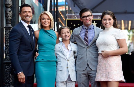Television personality Kelly Ripa, second from left, poses with, left to right, her husband Mark Consuelos and their children Joaquin, Michael and Lola during a ceremony awarding Ripa with a star on the Hollywood Walk of Fame, in Los Angeles
APTOPIX Kelly Ripa Honored With a Star on the Hollywood Walk of Fame, Los Angeles, USA - 12 Oct 2015