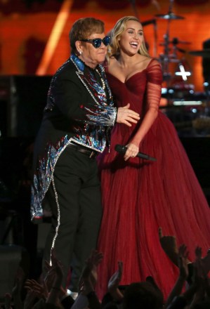 Elton John, Miley Cyrus. Elton John and Miley Cyrus perform "Tiny Dancer" at the 60th annual Grammy Awards at Madison Square Garden, in New York
60th Annual Grammy Awards - Show, New York, USA - 28 Jan 2018
