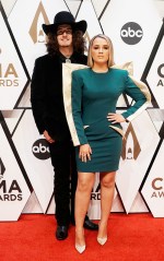 Cade Foehner, left, and Gabby Barrett arrive at the 55th annual CMA Awards, at the Bridgestone Arena in Nashville, Tenn
55th Annual Country Music Awards - Arrivals, Nashville, United States - 10 Nov 2021