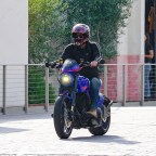 Keanu Reeves Cruises Motorcycle BG