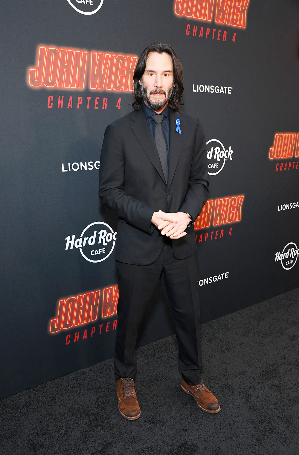 Why Keanu Reeves wore blue ribbon to 'John Wick 4' premiere - Los Angeles  Times
