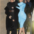 Sisters Kylie Jenner and Khloe Kardashian exit Nobu arm in arm after enjoying dinner with the family