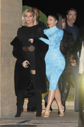 Malibu, CA - Sisters Kylie Jenner and Khloe Kardashian leave Nobu arm in arm after enjoying dinner with the family.  Kim Kardashian, mom Kris Jenner with boyfriend Corey Gamble and Kourtney Kardashian were right behind them exiting the restaurant.  Pictured: Khloe Kardashian, Kylie Jenner, Kris Jenner BACKGRID USA 9 JANUARY 2020 BYLINE MUST READ: JACK / BACKGRID USA: +1 310 798 9111 / usasales@backgrid.com UK: +44 208 344 2007 / uksales@backgrid.com * UK Clients - Pictures Containing Children Please Pixelate Face Prior To Publication *