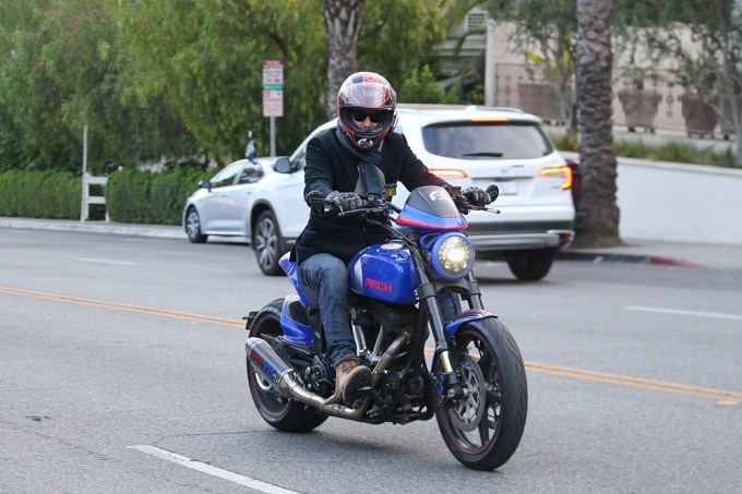 Keanu Reeves rides his motorcycle to lunch