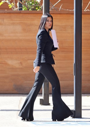 Los Angeles, CA  - *EXCLUSIVE*  - Just Married! Kourtney Kardashian displays her curves in all-black as we spot the KUWTK star for the first time since she wed Travis Barker in Las Vegas.Pictured: Kourtney KardashianBACKGRID USA 6 APRIL 2022 USA: +1 310 798 9111 / usasales@backgrid.comUK: +44 208 344 2007 / uksales@backgrid.com*UK Clients - Pictures Containing ChildrenPlease Pixelate Face Prior To Publication*