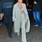 Kourtney Kardashian arrives to dinner with family and friends in see through lace bra
