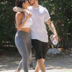 Nikki Bella shares a tender kiss with Artem Chigvintsev as they go for a hike