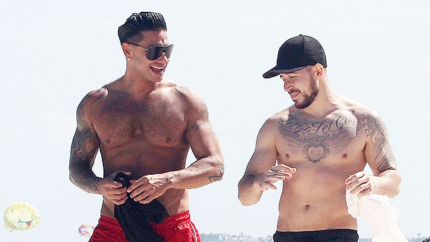 Pauly D and Vinny Guadagnino stripped shirtless for a walk on the beach, an...