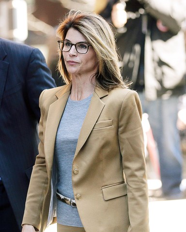 Lori Loughlin arrives at federal court in Boston, to face charges in a nationwide college admissions bribery scandal
College Admissions-Bribery, Boston, USA - 03 Apr 2019