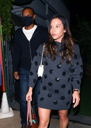 Santa Monica, CA  - *EXCLUSIVE*  - Is Erica Herman pregnant?  Tiger Woods and Erica Herman leave after dinner with friends at Giorgio Baldi in Santa Monica.Pictured: Tiger Woods, Erica HermanBACKGRID USA 16 FEBRUARY 2022 USA: +1 310 798 9111 / usasales@backgrid.comUK: +44 208 344 2007 / uksales@backgrid.com*UK Clients - Pictures Containing ChildrenPlease Pixelate Face Prior To Publication*