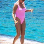 EXCLUSIVE: Caroline Stanbury flaunted a pink bikini with her husband Sergio Carrallo on the SuperYacht with their friends