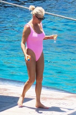 EXCLUSIVE: 46-year-old Caroline Stanbury flaunted a pink bikini with her husband Sergio Carrallo on the SuperYacht with their friends. 29 Jun 2022 Pictured: Caroline Stanbury. Photo credit: A LONE WOLF / MEGA TheMegaAgency.com +1 888 505 6342 (Mega Agency TagID: MEGA873306_012.jpg) [Photo via Mega Agency]